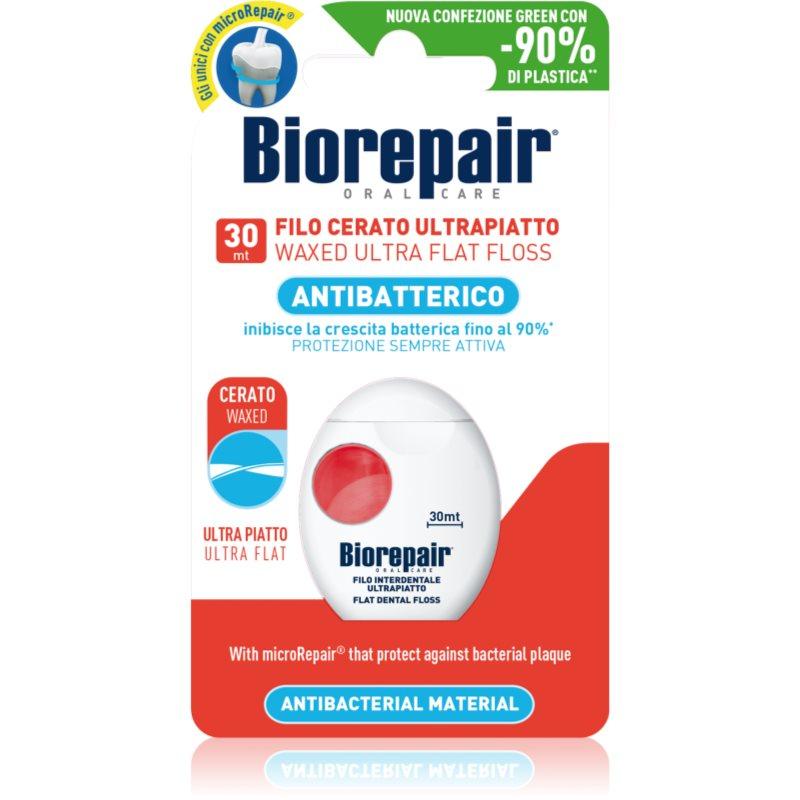 Biorepair Dental Floss Waxed Ultra Flat nevoskovaná dentální nit pro citlivé zuby Red 30 m