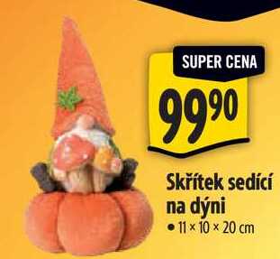 Skřítek sedící na dýni